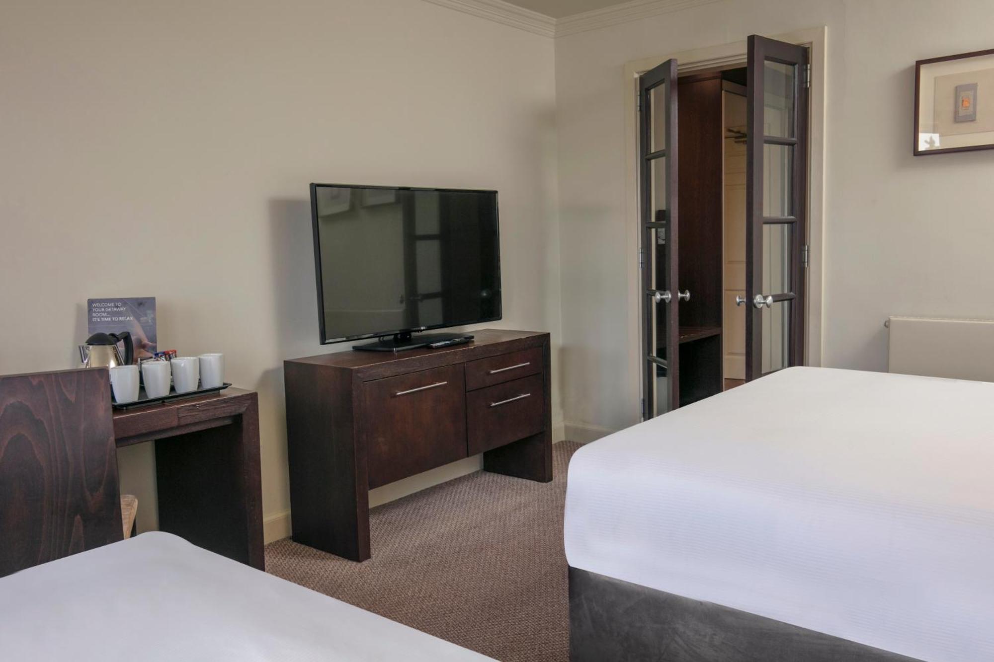 Glasgow Westerwood Hotel, Spa & Golf Resort Камбернолд Номер фото